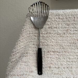 Foley KITCHAMAJIG Slotted Spoon Strains Whips Mixes Utensil Vtg Black Handle USA
